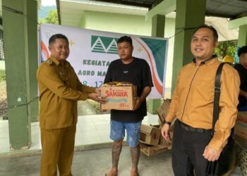 Sinergi Kodim 1310/Bitung Dan PT. Agro Makmur Raya (AMR) Gelar Aksi Sosial Bagi-Bagi Sembako