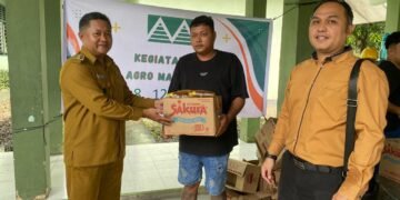 Sinergi Kodim 1310/Bitung Dan PT. Agro Makmur Raya (AMR) Gelar Aksi Sosial Bagi-Bagi Sembako