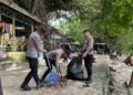Ditpolairud Polda Papua Barat Bersama Komunitas dan Warga Gelar Aksi Bersih Pantai Pasir Putih
