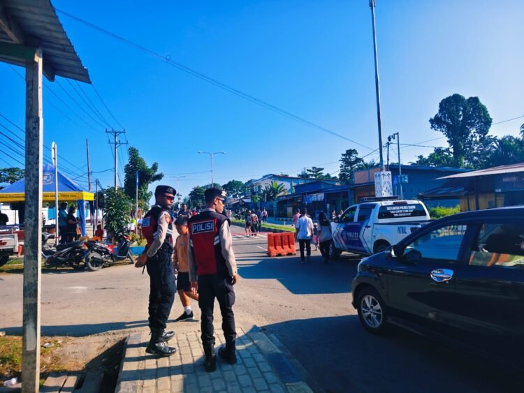 Personel Pos Shelter Sat Samapta Polres Sarmi Amankan Car Free Day di Mararena