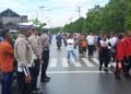 Sat Lantas Polres Sarmi Kawal Jalan Santai Hardiknas, Imbau Peserta dan Pengendara