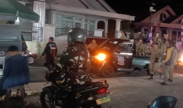 Sinergi TNI, Polri dan Pemerintah Daerah, Personel Kodim 1310/Bitung Patroli Gabungan Ciptakan Situasi Aman dan Kondusif di Wilayah Minahasa Utara