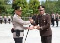Kapolres Sarmi Pimpin Prosesi Wisuda Purna Bakti, Pengabdian AKP Yulianus Mapeni Kim, SE Diabadikan dengan Penuh Kehormatan
