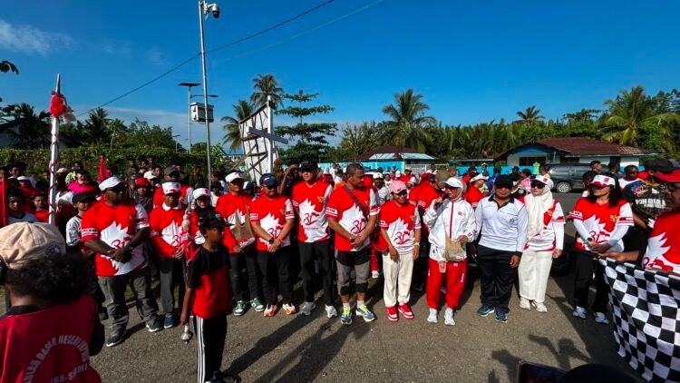 Semarak HUT RI ke-81, Polres Sarmi Meriahkan Jalan Santai Berhadiah Bersama Masyarakat
