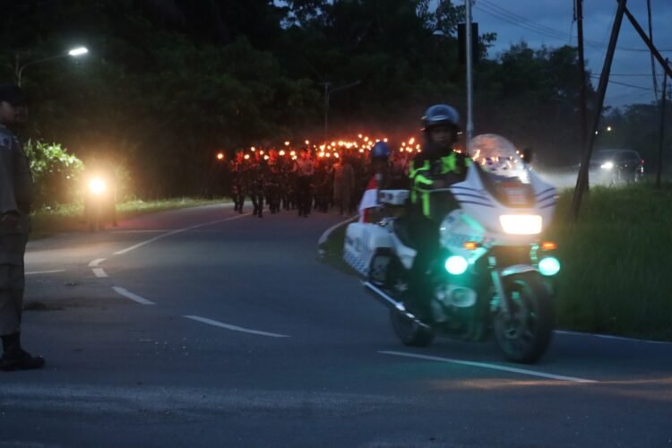 Obor Kemerdekaan Terangi Sarmi, Kapolres Hadiri Taptu HUT ke-81 RI