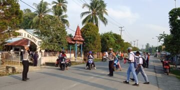 Polisi Hadir di Tengah Aktivitas Pagi, Sat Lantas Polres Sarmi Cegah Kemacetan dan Kecelakaan