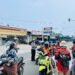 Antisipasi Dampak Kabut Asap Karhutla Papua Nugini, Sat Lantas Polres Sarmi Bersinergi dengan BPBD Bagikan Masker