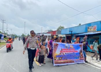 Sat Lantas Polres Sarmi Kawal Karnaval Religius Par Gki Diaspora Neidam, Arus Lalu Lintas Tetap Lancar